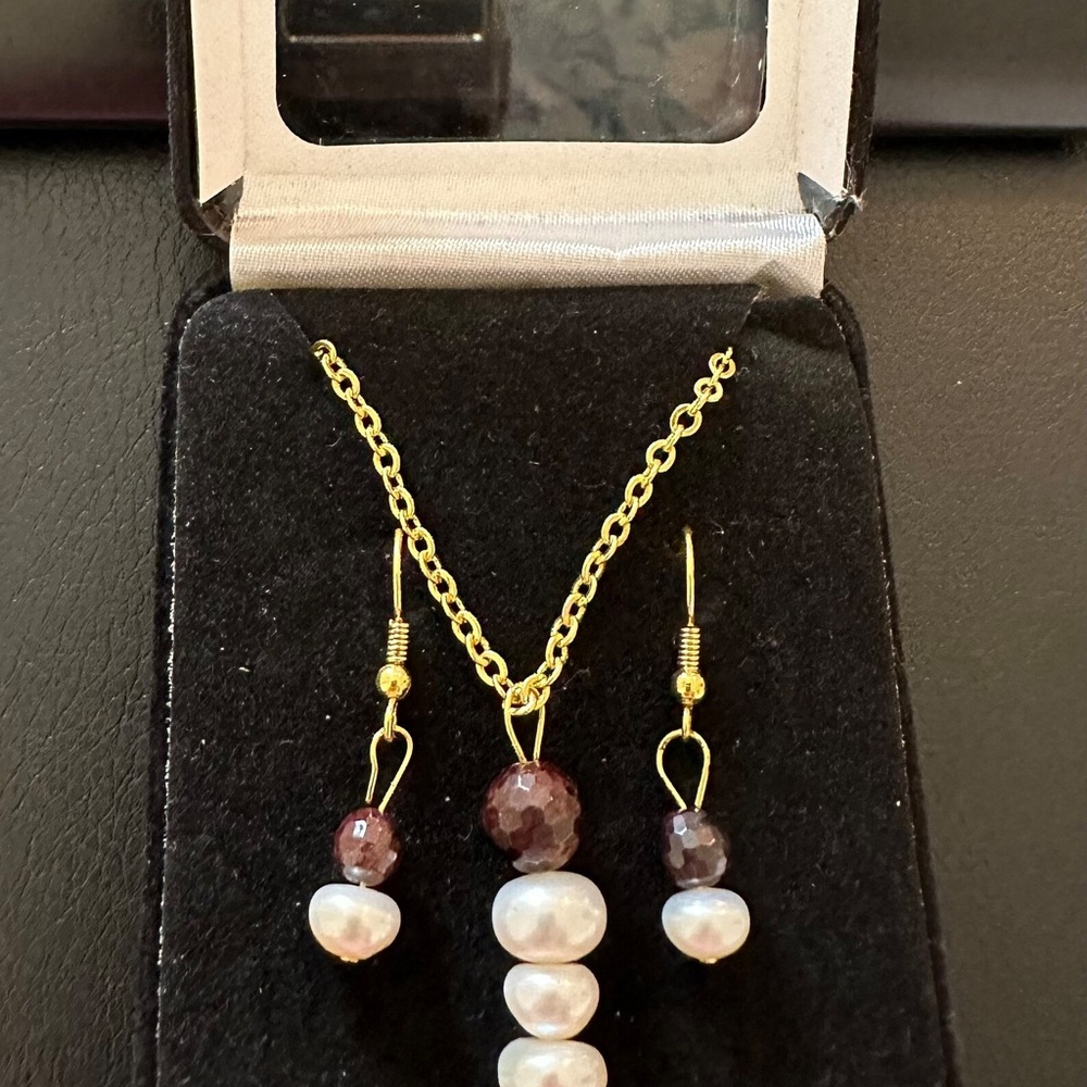 Vintage fresh water pearl and gemstone necklace with matching earrings.
